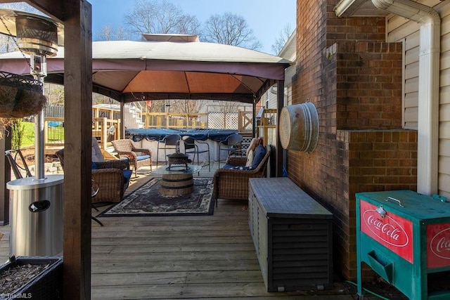 wooden terrace with a gazebo