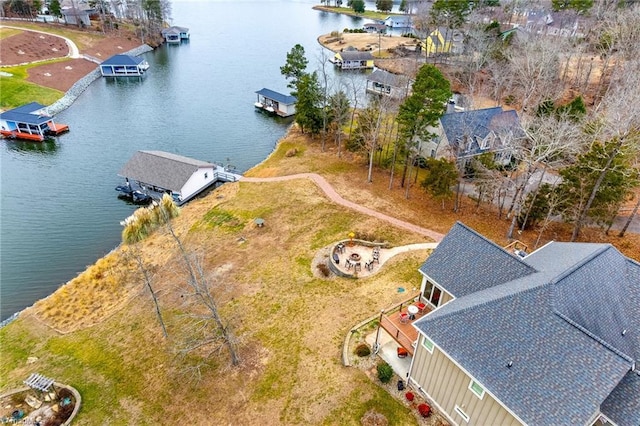 bird's eye view with a water view