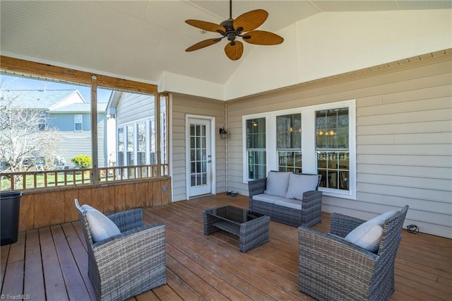 deck with an outdoor hangout area and a ceiling fan