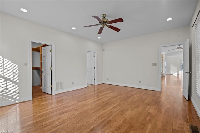 interior space featuring light hardwood / wood-style flooring and ceiling fan