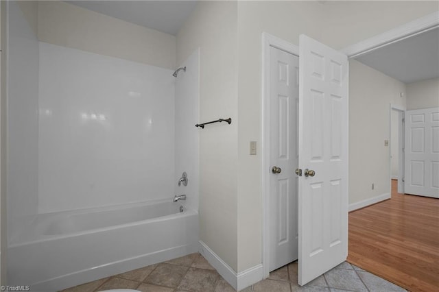 bathroom featuring  shower combination