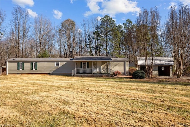 view of front of home featuring a front yard and covered porch