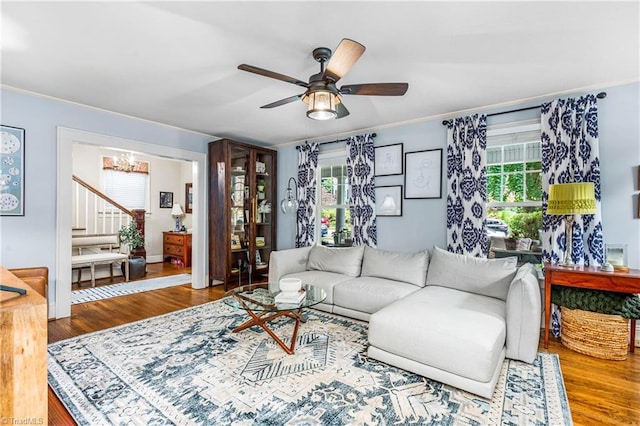 2065 Craig St, Winston-Salem, NC 27103 - living area with wood finished floors, a chandelier, ornamental molding, and ceiling fan