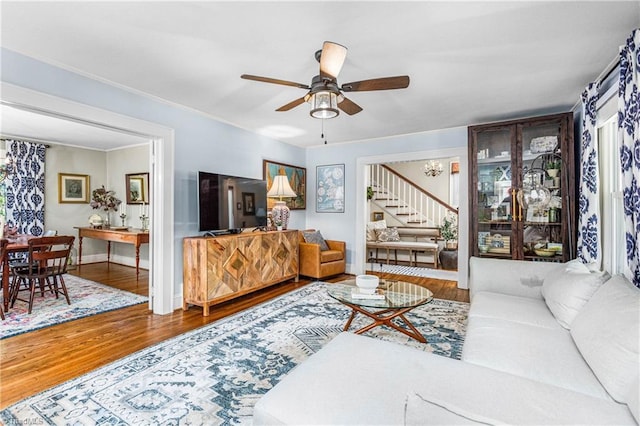 2065 Craig St, Winston-Salem, NC 27103 - living area featuring stairway, ceiling fan, and wood finished floors