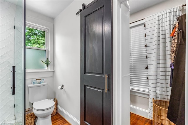 2065 Craig St, Winston-Salem, NC 27103 - bathroom with wood finished floors and tiled shower