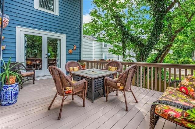 2065 Craig St, Winston-Salem, NC 27103 - wooden terrace featuring french doors and outdoor dining area