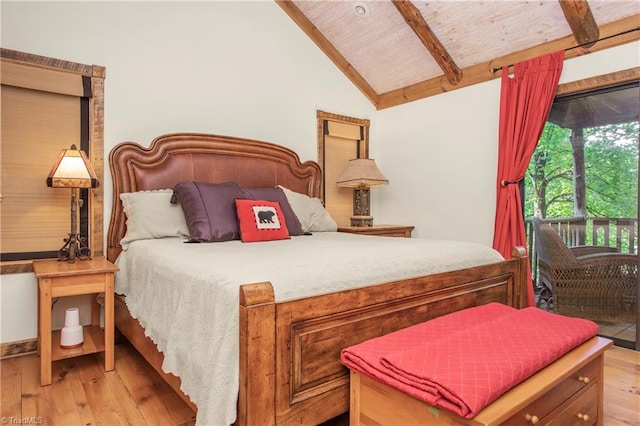 bedroom with lofted ceiling with beams, wood ceiling, and light hardwood / wood-style floors