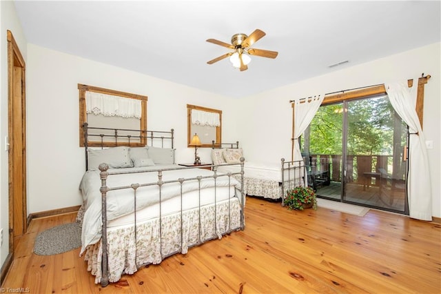 bedroom with ceiling fan, light wood-type flooring, and access to outside