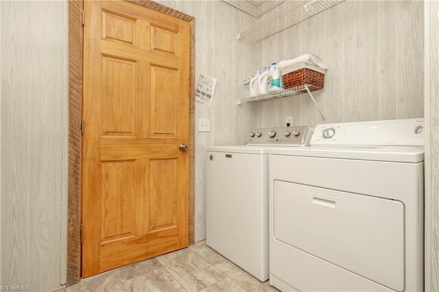 washroom featuring washer and dryer