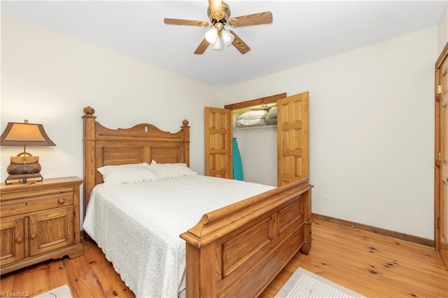 bedroom with a closet, ceiling fan, and light hardwood / wood-style floors