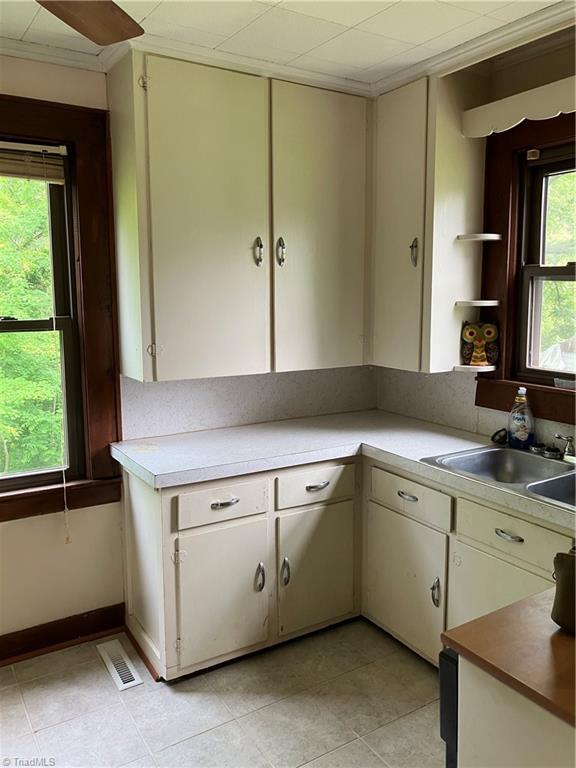 2096 Fancy Gap Rd, Mount Airy, NC 27030 - kitchen featuring a sink, light countertops, and light tile patterned flooring