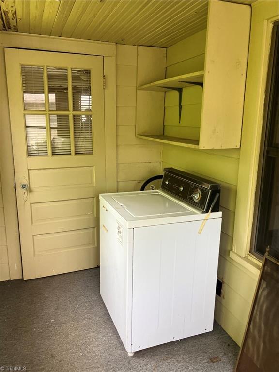 2096 Fancy Gap Rd, Mount Airy, NC 27030 - laundry area featuring washer / clothes dryer, wood ceiling, and dark carpet
