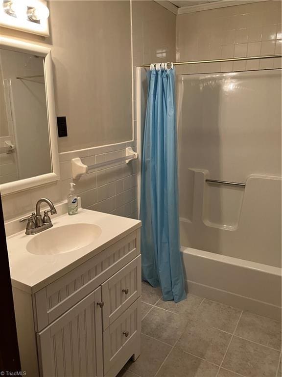2096 Fancy Gap Rd, Mount Airy, NC 27030 - full bath featuring shower / bath combo with shower curtain, vanity, and tile patterned flooring