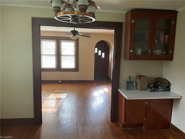 2096 Fancy Gap Rd, Mount Airy, NC 27030 - foyer entrance featuring hardwood / wood-style floors, arched walkways, baseboards, crown molding, and ceiling fan