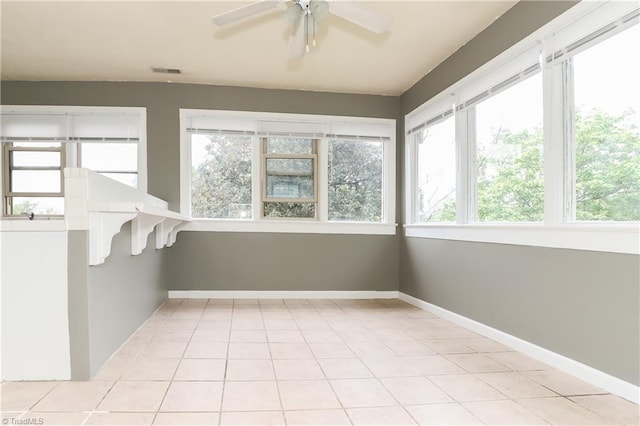 1025 W End Blvd, Winston-Salem, NC 27101 - unfurnished sunroom with baseboards, visible vents, and tile patterned flooring