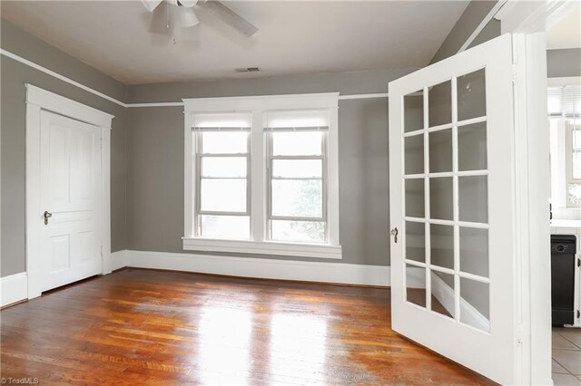 1025 W End Blvd, Winston-Salem, NC 27101 - unfurnished bedroom featuring baseboards, visible vents, and wood finished floors