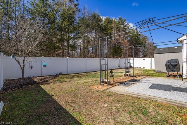 view of yard with a fenced backyard and a patio area