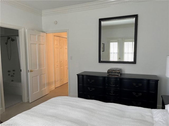 bedroom with crown molding and light carpet