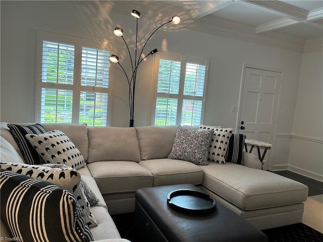 living room with a wealth of natural light, coffered ceiling, and ornamental molding