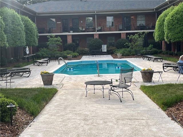 view of pool with a patio