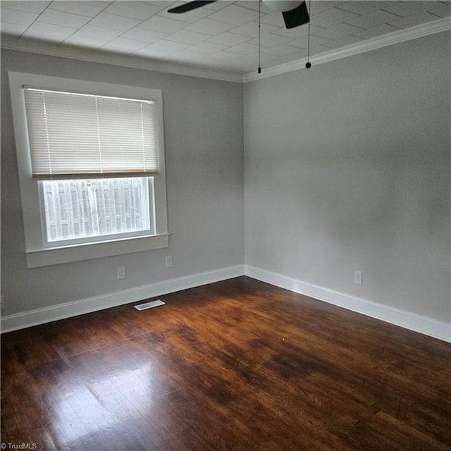 112 Kime St, Burlington, NC 27215 - spare room featuring ornamental molding, a ceiling fan, wood finished floors, and baseboards