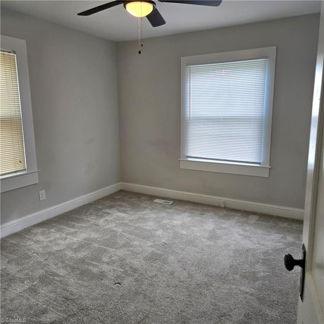 112 Kime St, Burlington, NC 27215 - carpeted spare room with ceiling fan and baseboards