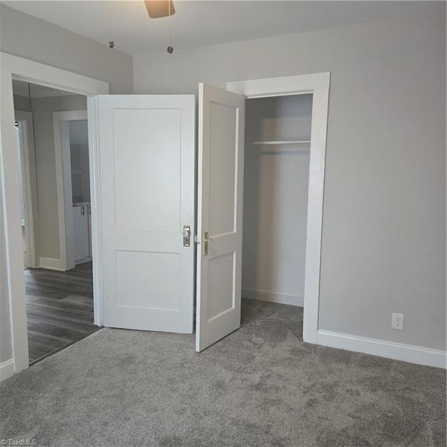 112 Kime St, Burlington, NC 27215 - unfurnished bedroom featuring carpet floors, baseboards, and a closet
