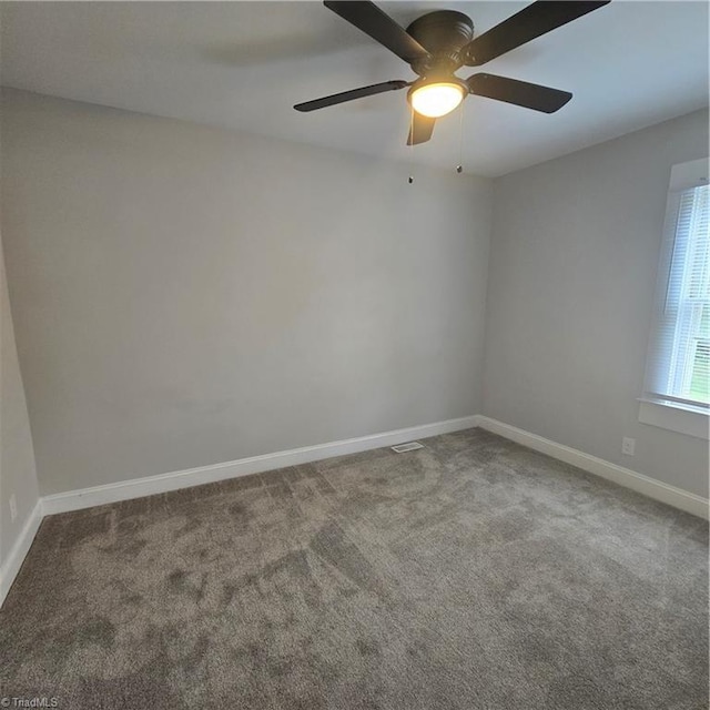 112 Kime St, Burlington, NC 27215 - empty room featuring carpet, baseboards, and a ceiling fan