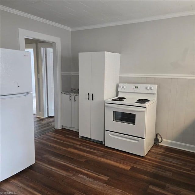 112 Kime St, Burlington, NC 27215 - kitchen with white appliances, dark wood-style floors, white cabinets, ornamental molding, and a wainscoted wall