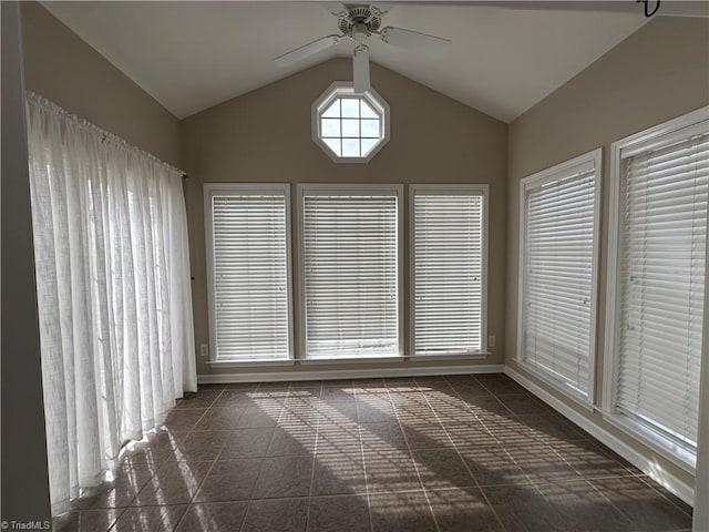 unfurnished sunroom featuring vaulted ceiling and ceiling fan