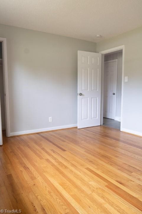 empty room featuring light hardwood / wood-style floors