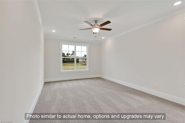 carpeted empty room featuring a ceiling fan, baseboards, and recessed lighting