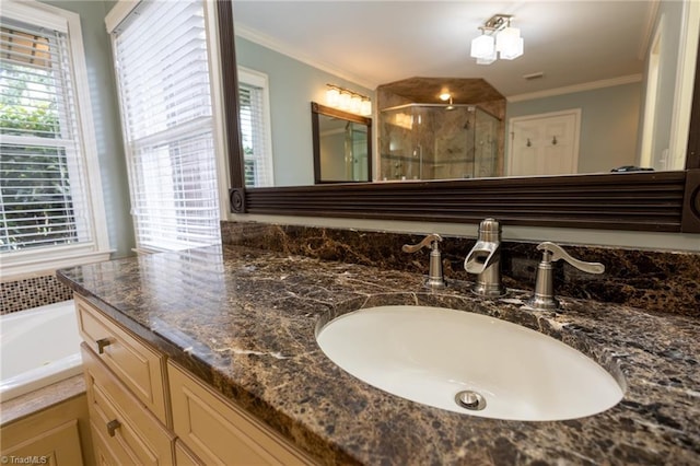 bathroom with vanity, crown molding, and shower with separate bathtub