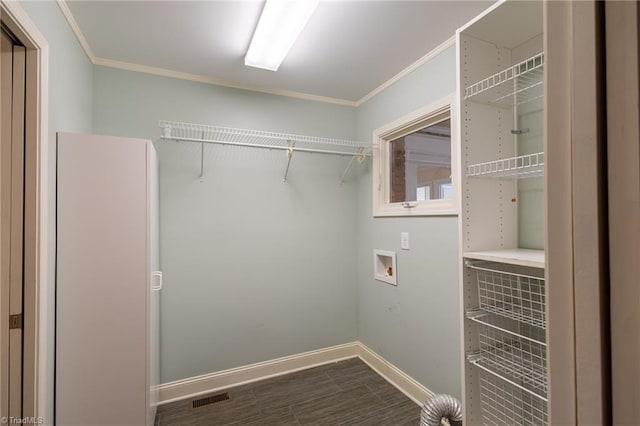 laundry room with washer hookup and crown molding