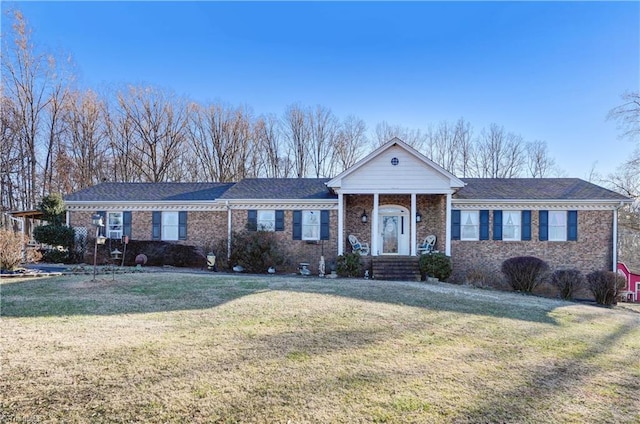 ranch-style house with a front lawn