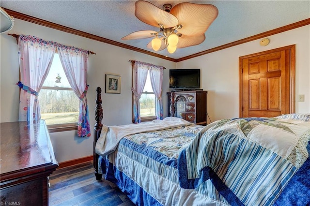 bedroom featuring a textured ceiling, dark hardwood / wood-style floors, ceiling fan, and ornamental molding