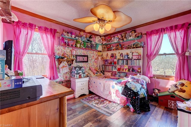 bedroom featuring ceiling fan, wood-type flooring, and a textured ceiling