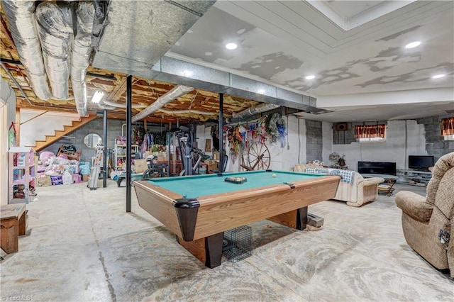 game room with concrete flooring and pool table