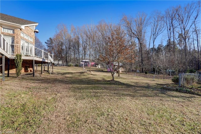 view of yard with a deck