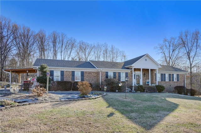 single story home featuring a front yard and a carport