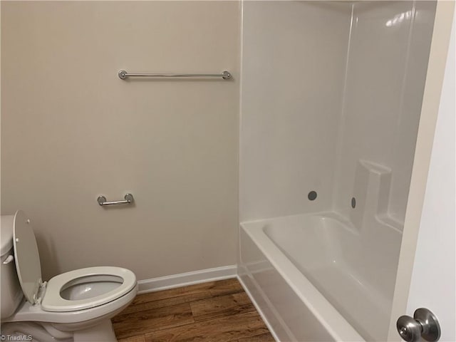 2015 Ram Rd, Greensboro, NC 27405 - full bath featuring wood finished floors and shower / washtub combination
