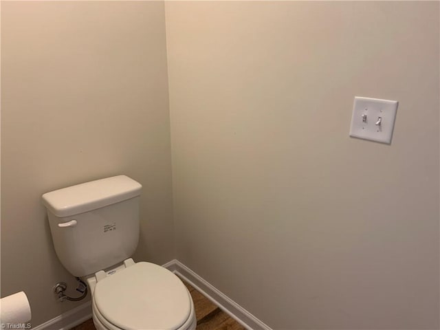 2015 Ram Rd, Greensboro, NC 27405 - bathroom with baseboards and toilet