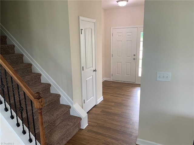 2015 Ram Rd, Greensboro, NC 27405 - foyer featuring dark wood-style flooring and stairway