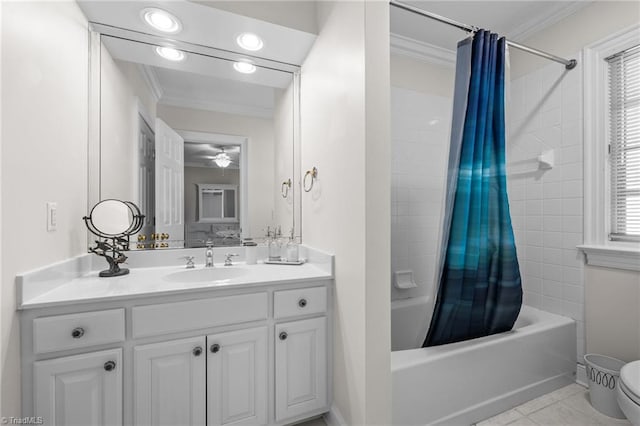 full bathroom featuring toilet, crown molding, vanity, shower / bath combo with shower curtain, and tile patterned flooring