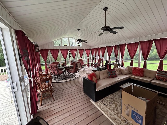 wooden terrace featuring an outdoor living space and ceiling fan