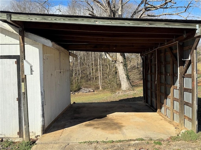 view of parking / parking lot with an attached carport