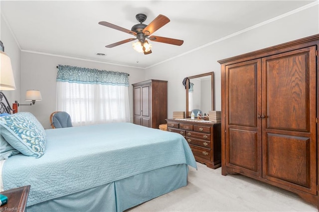 bedroom featuring light carpet, ceiling fan, and crown molding