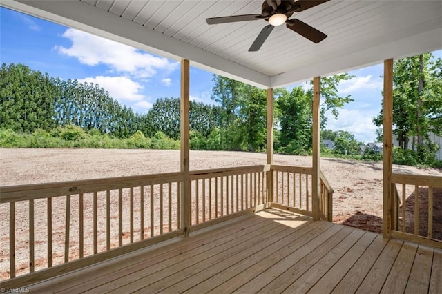 wooden deck featuring ceiling fan