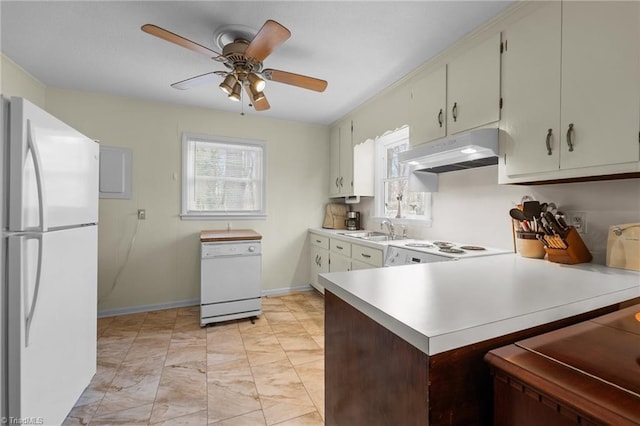 kitchen with ceiling fan, white appliances, under cabinet range hood, light countertops, and a sink