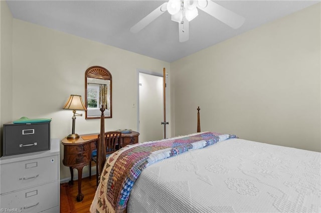 bedroom with baseboards, a ceiling fan, and wood finished floors